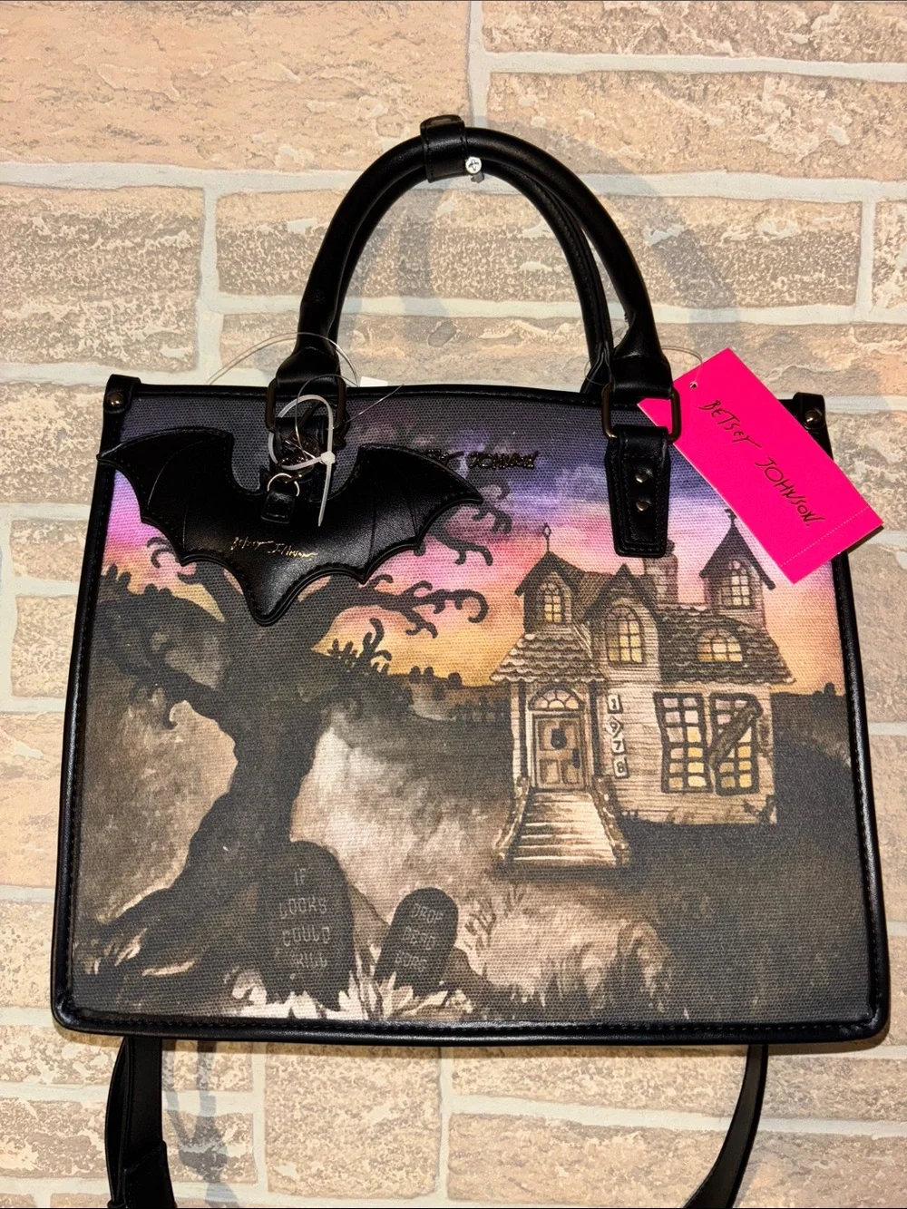Betsey Johnson Black Satchel with Purple-Pink Sunset Haunted House bat Art
